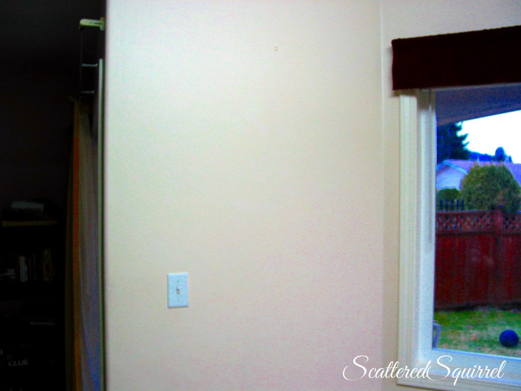 blank wall in breakfast nook.