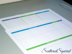 Image of planner pages for tracking special dates and planning monthly goals on a grey table.