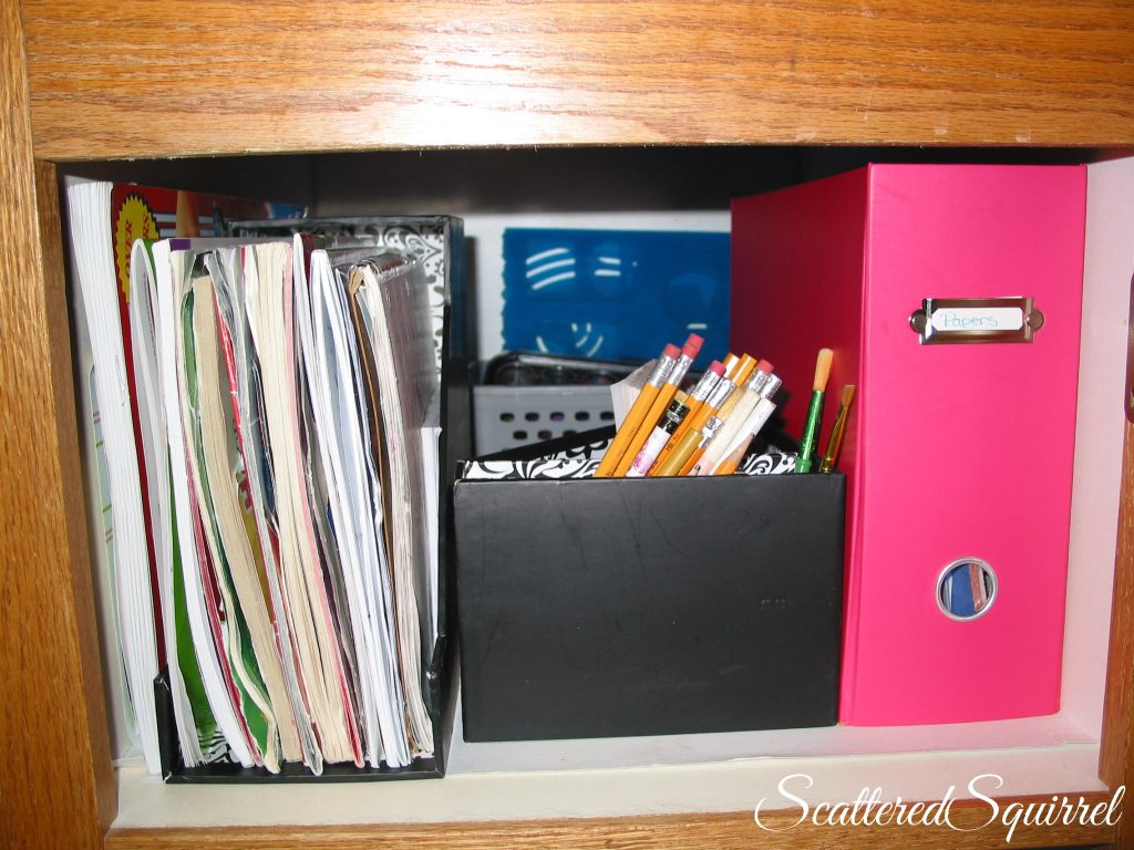 paper, coloring books, notebooks and pencil storage