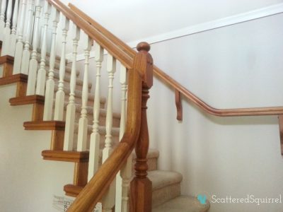 Our stair cases wood hand railings and riser trim. | ScatteredSquirrel.com