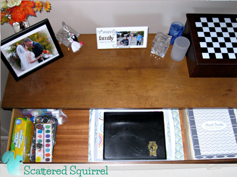 Top drawer of the buffet is all organized, paint supplies on the left, serving trays and spare placemats in the middle, and our kitchen binder on the right.