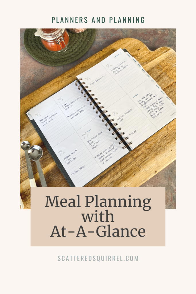 Blog Post title image, shows a planner open to a two week spread on a cutting board, underneath the text reads Meal Planning with At-A-Glance