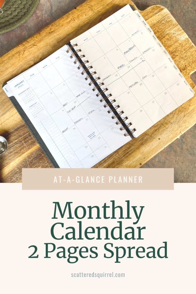 A planner lying open on a cutting board to show a monthly calendar spread over two pages. On the left hand side it say January 2022 in blue text followed by small monthly calendars for December 2021 and February 2022. Under those is section for a checklist. The calendar grid is outlined in a medium brown and the date number match. The text is all in a blue, serif font so it pops on the page.