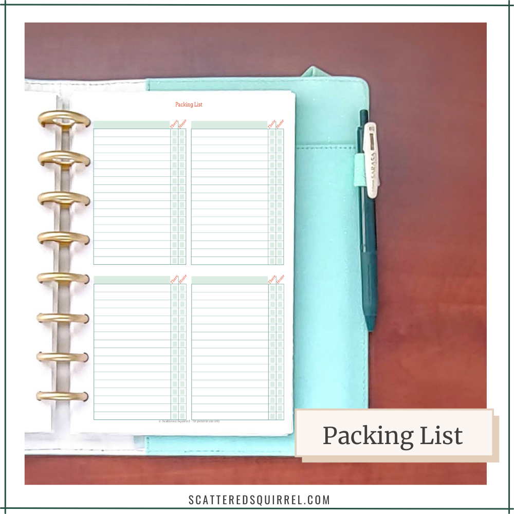 An auqa planner with gold disc binding shows a packing list page with room for four different people or categories.