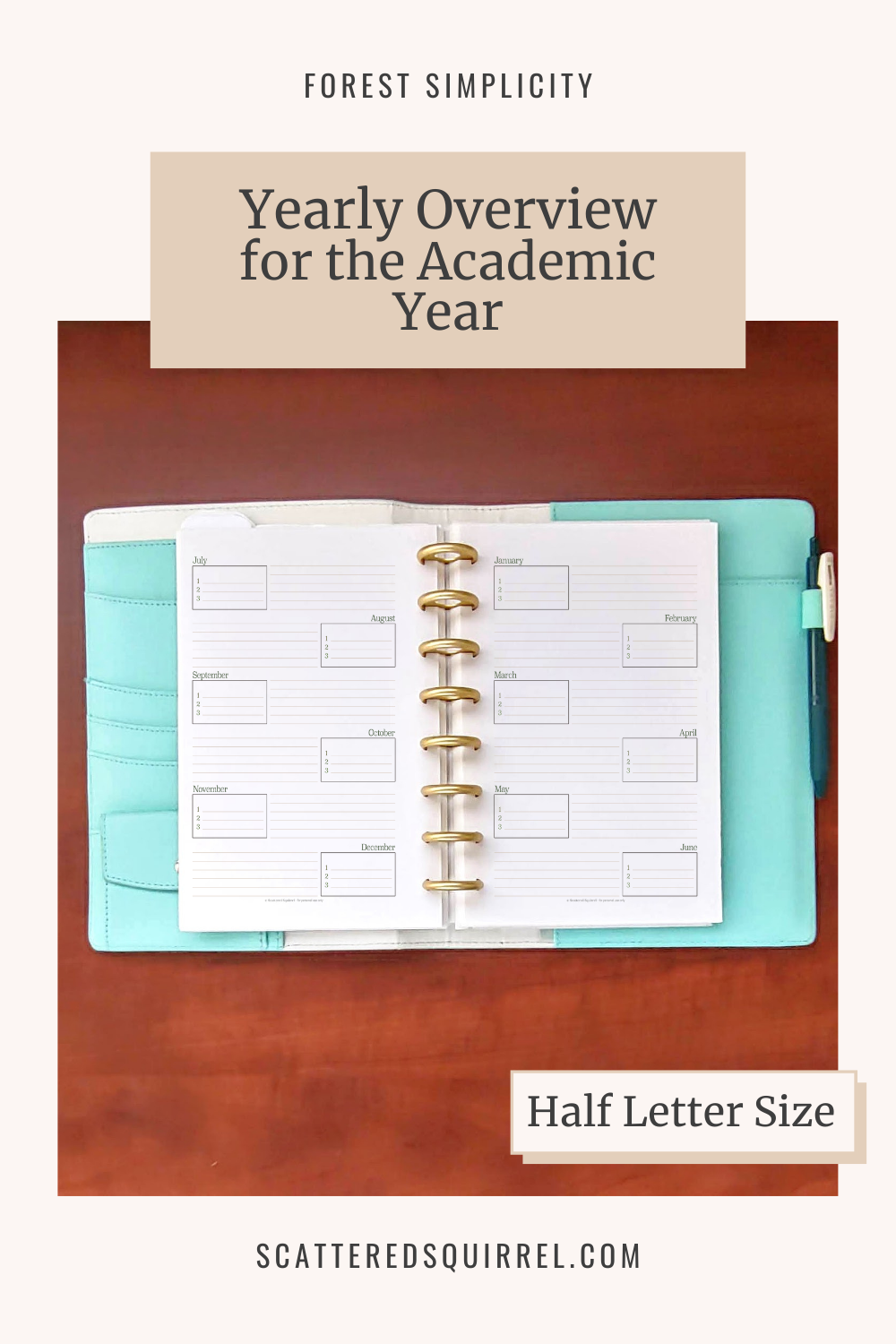 Image Reads - Yearly Overview for the Academic Year and shows an A5 planner open on a wooden desk. The pages are divided into 6 sections each for the months starting in July. Each section has room for top three goals or priorites and a notes section.