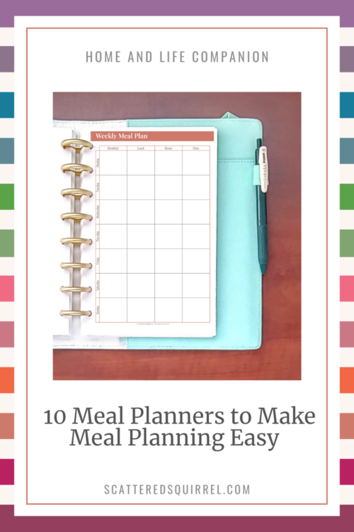 This image features a white rectangle centred on a rainbow striped background. At the top it says " Home and Life Companion". Below that text is a picture of a planner lying open on a wooden desk. The planner shows a meal planner. Under the image reads "10 Meal Planners to Make Meal Planning Easy."