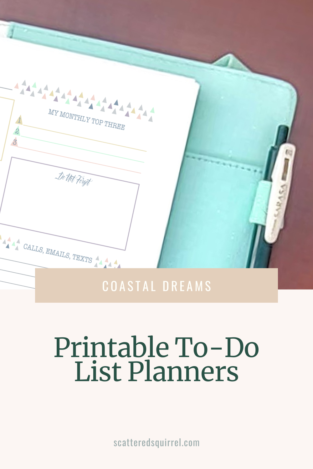 The image starts with a close up photo of the top right corner of a teal and white leather like planner laying on a wooden desk. The planner page shows the top right sections of a monthly to-do list planner. Overlapping the photo and the sand background of the last third of the image, is a tan box with white text that says "Coastal Dreams." In the sand coloured area at the bottom of the image is dark green text that says "Printable To-Do List Planners."