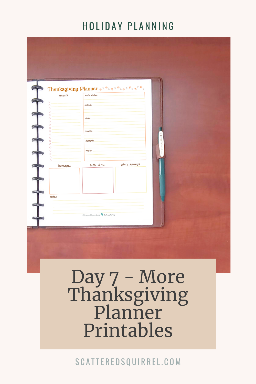 This tall, pale tan rectangle reads "Holiday Planning" in green text at the top. Underneath is a picture of a brown leather planner lying open on a wooden desktop. It shows the right side of the planner which has an Thanksgiving Planner page. Overlapping a small portion of the center of the picture is a beige box with dark text that says "Day 7 - More Thanksgiving Planner Printables."