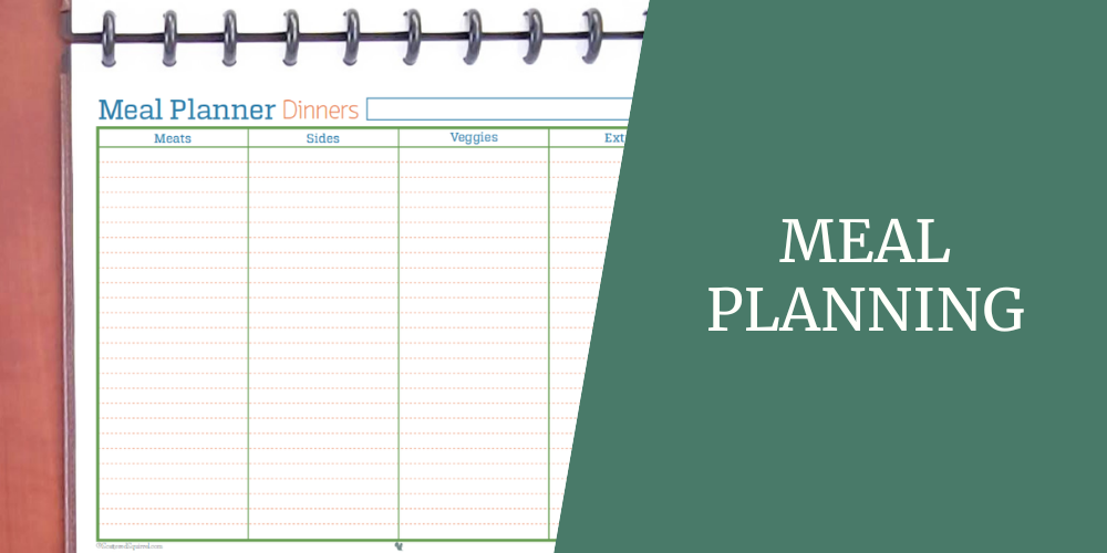 "Meal Planner Dinners" printable on a binder ring, with columns for meats, sides, veggies, and extras